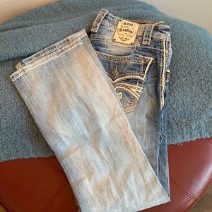 Distressed, with holes(purchased), 5 pocket Rock Revival Ocean Boot Cut Jeans